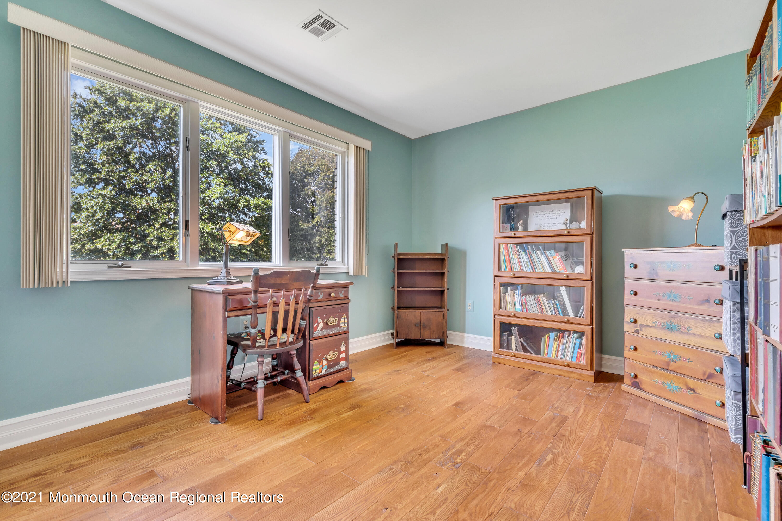 230 Crest Hill Road Toms River, NJ 08755 - Photo 39 of 59 a view of a workspace with furniture and a window
