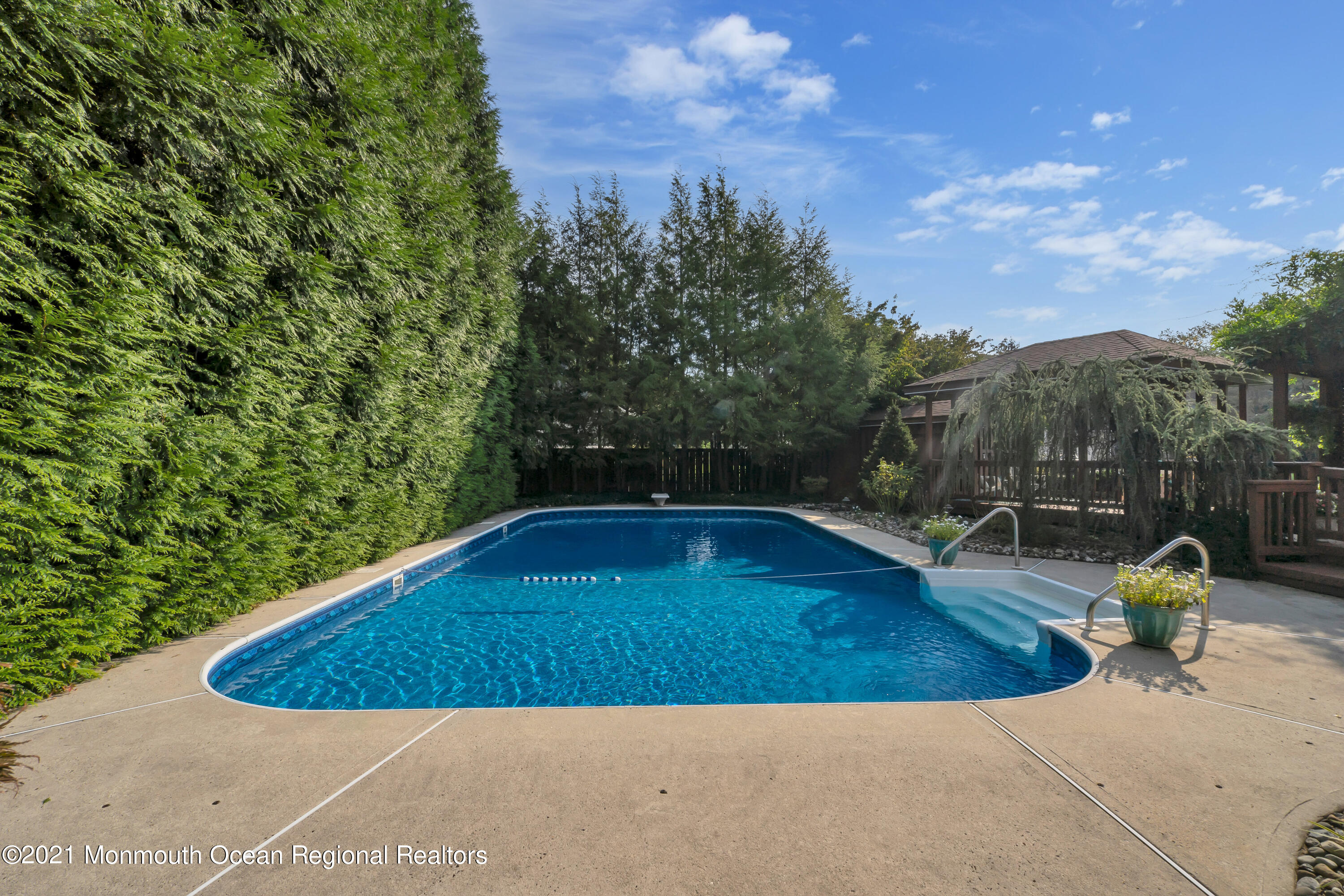 230 Crest Hill Road Toms River, NJ 08755 - Photo 51 of 59 a view of a swimming pool with a yard