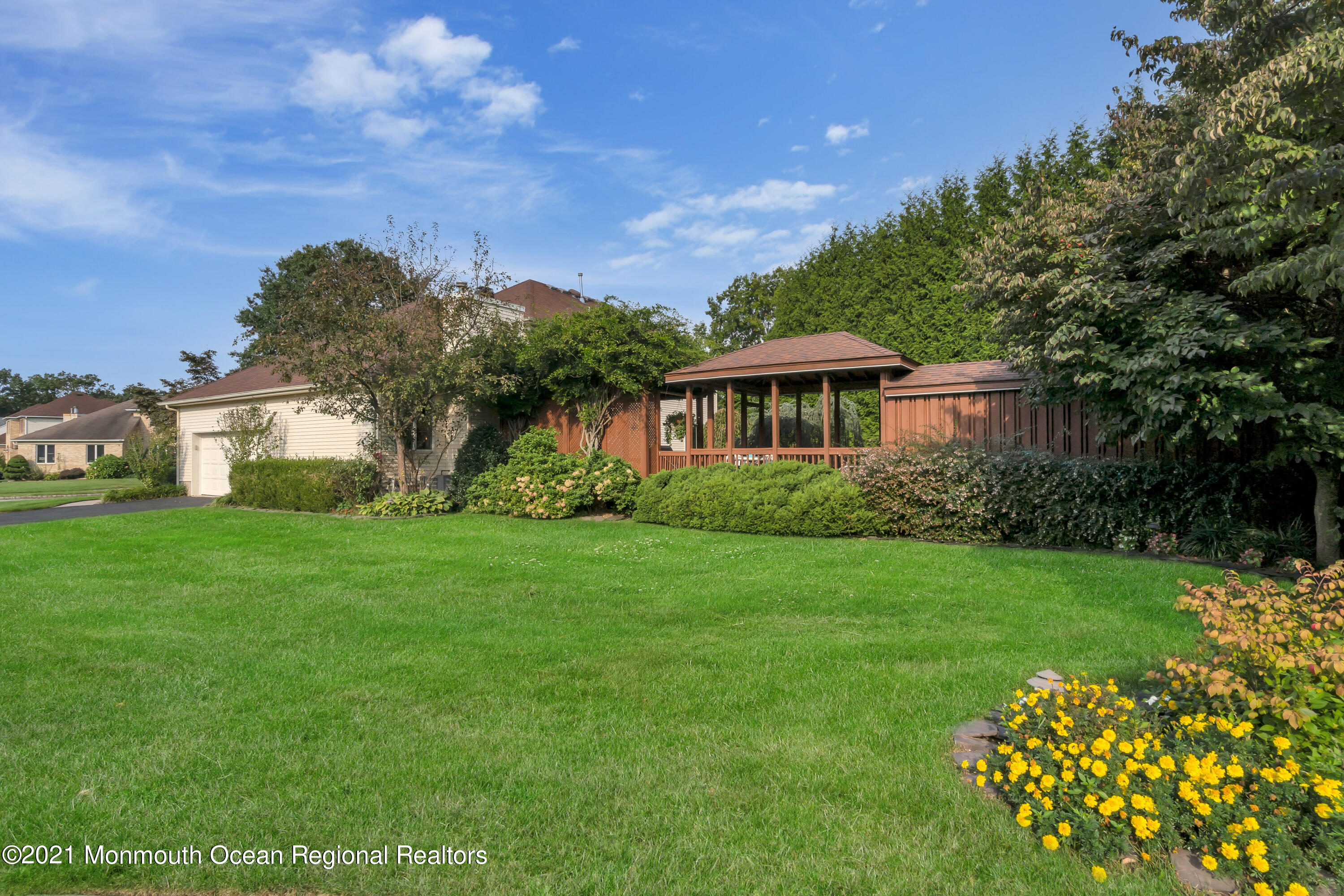 230 Crest Hill Road Toms River, NJ 08755 - Photo 57 of 59 a front view of a house with garden