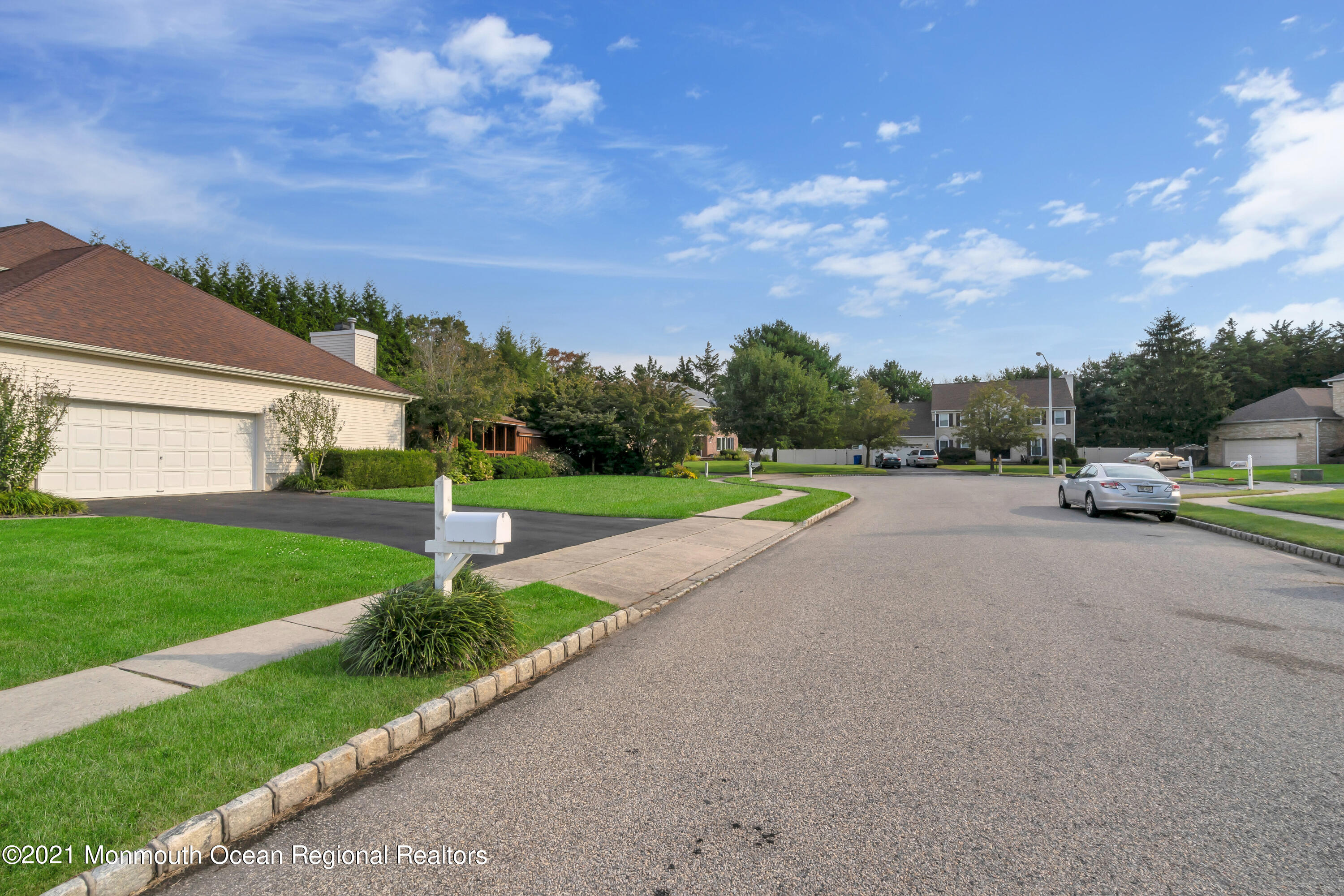 230 Crest Hill Road Toms River, NJ 08755 - Photo 59 of 59 a view of street with parked cars