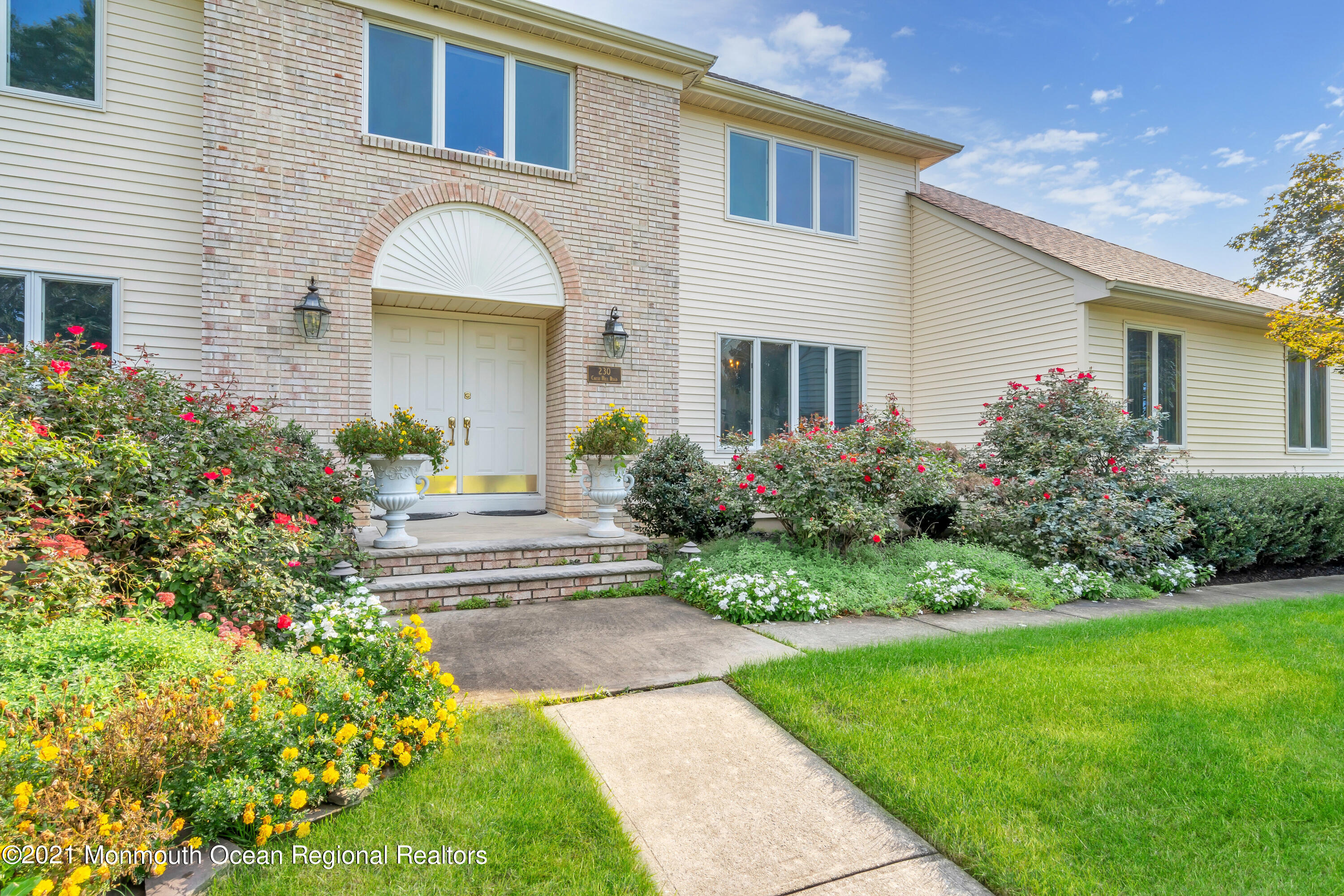 230 Crest Hill Road Toms River, NJ 08755 - Photo 8 of 59 a front view of a house with garden