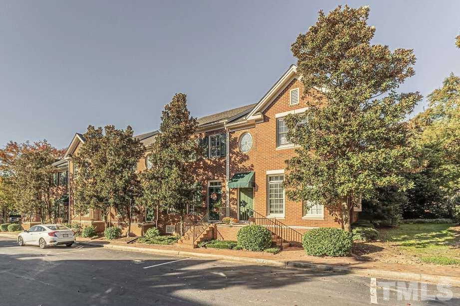 front view of a house with a street