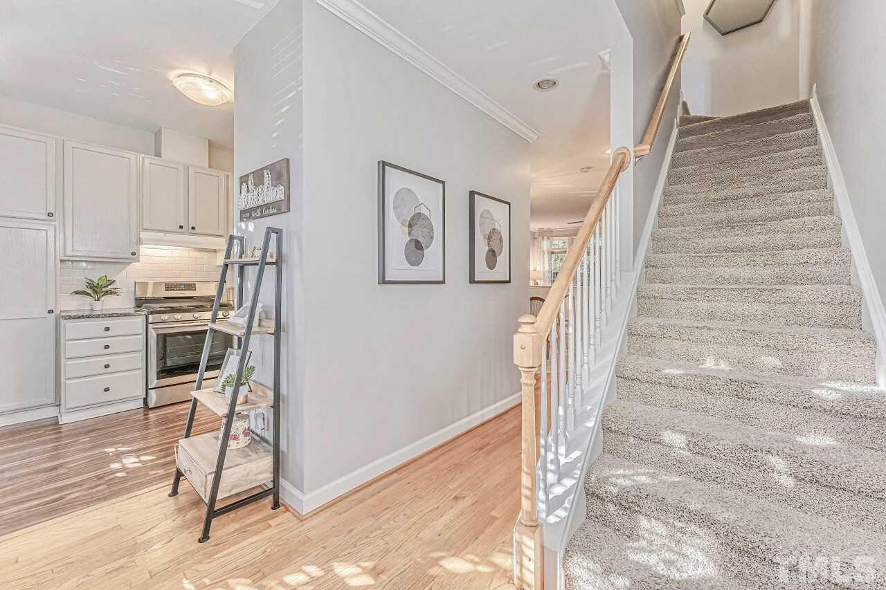 125 Fenner Lane Raleigh, NC 27603 - Photo 18 of 30 a view of kitchen with furniture and wooden floor