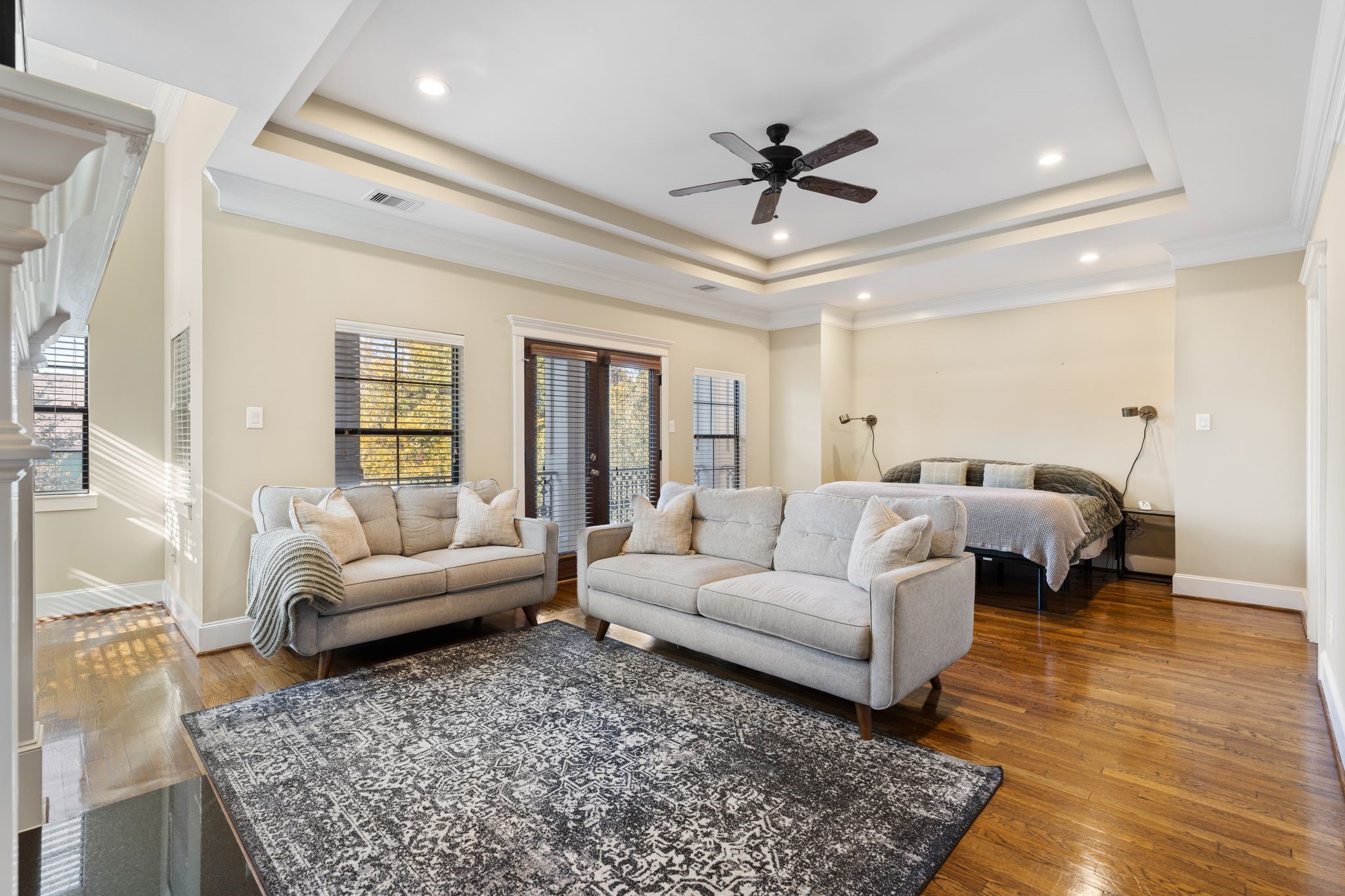 2502 Lawrence Street Houston, TX 77008 - Photo 16 of 26 Fabulous oversized primary bedroom equipped with gas log fireplace, walk-in closet, and versatile bonus area suitable to fit any of your needs!