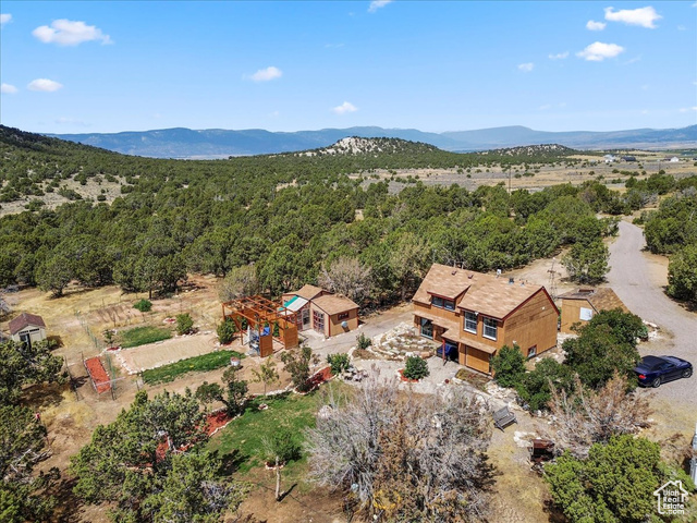 11450 Pigeon Hollow Road Spring City, UT 84662 - Photo 1 of 47 Aerial view of sparsely populated area with a mountainous background