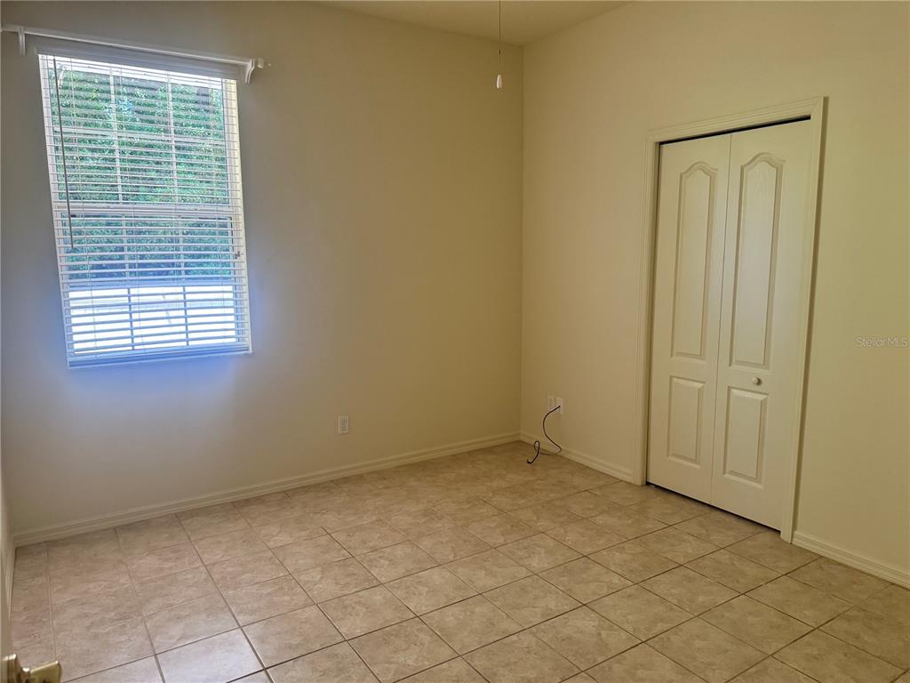 11145 Northwest 17th Court Road Ocala, FL 34475 - Photo 39 of 59 an empty room with windows