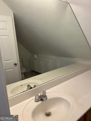 a bathroom with a sink and a vanity