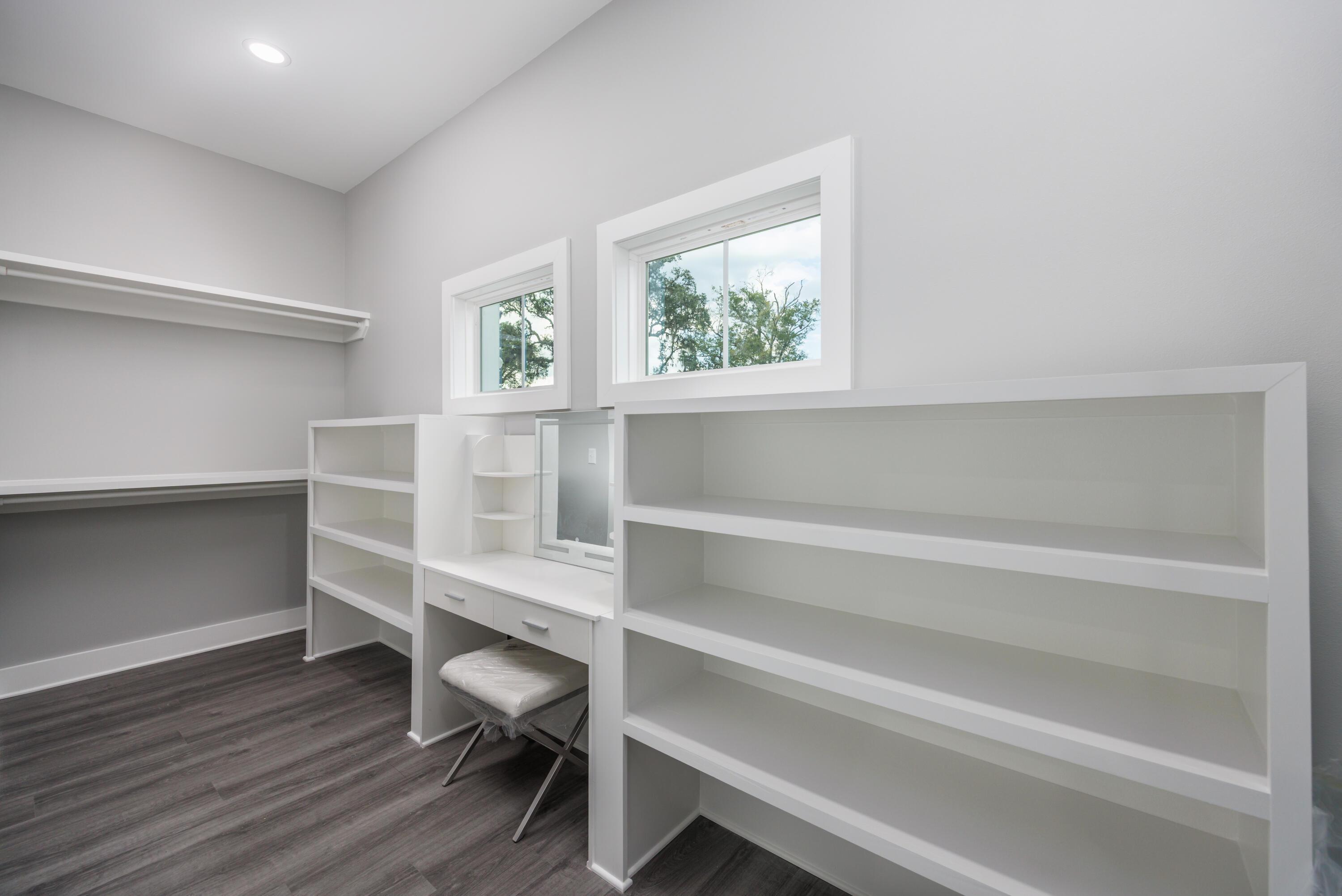 26 Shebbi Lane Freeport, FL 32439 - Photo 14 of 19 a view of walk in closet with empty racks