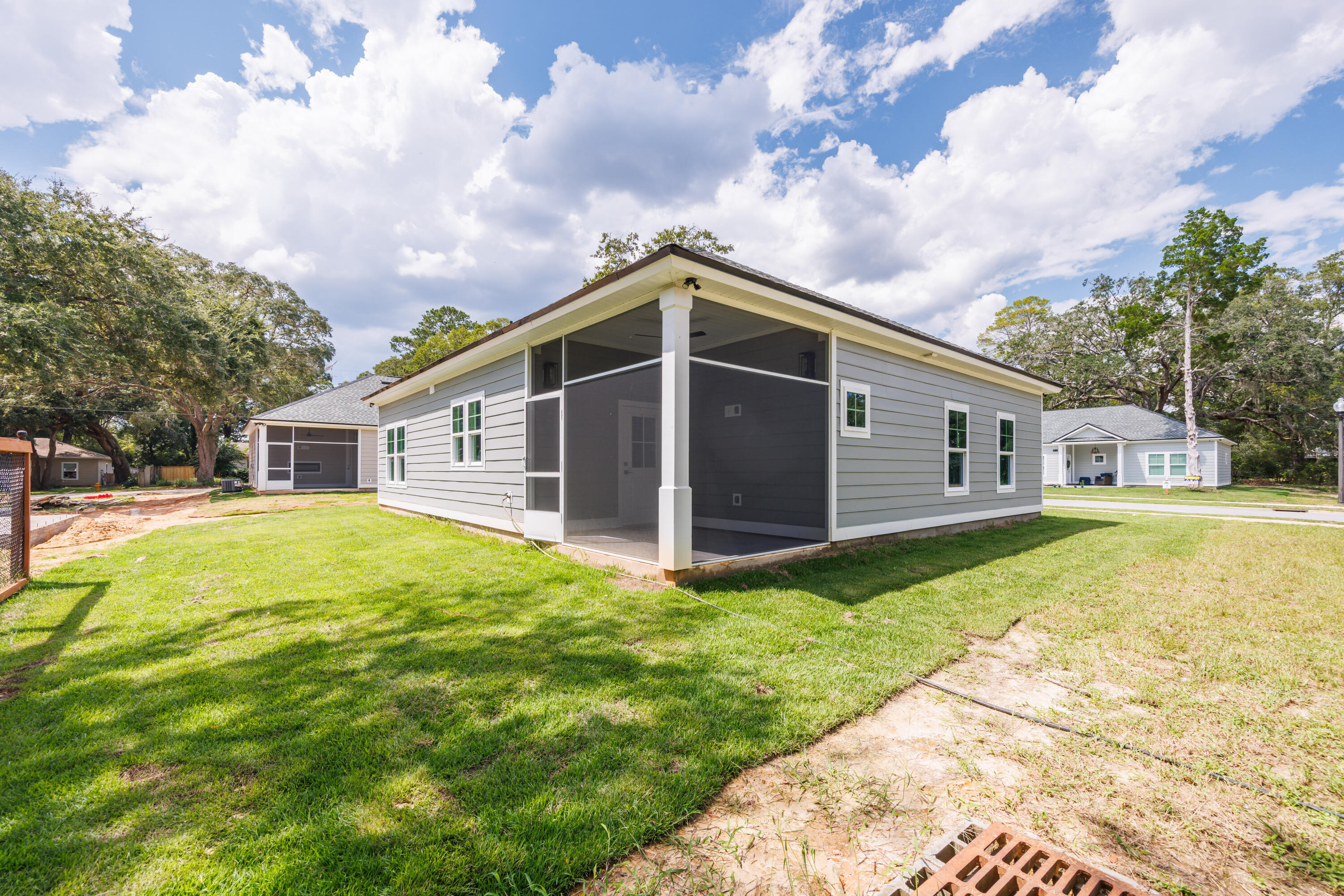26 Shebbi Lane Freeport, FL 32439 - Photo 18 of 19 a front view of house with yard and entertaining space