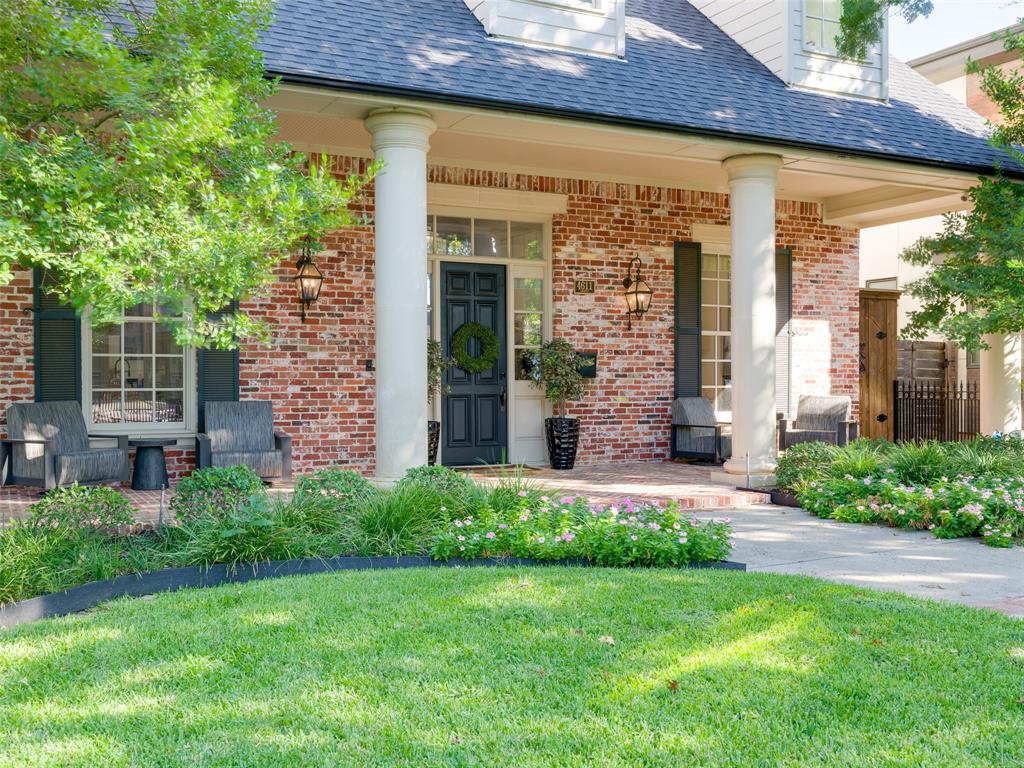 4611 West Amherst Avenue Dallas, TX 75209 - Photo 1 of 1 a front view of a house with a garden
