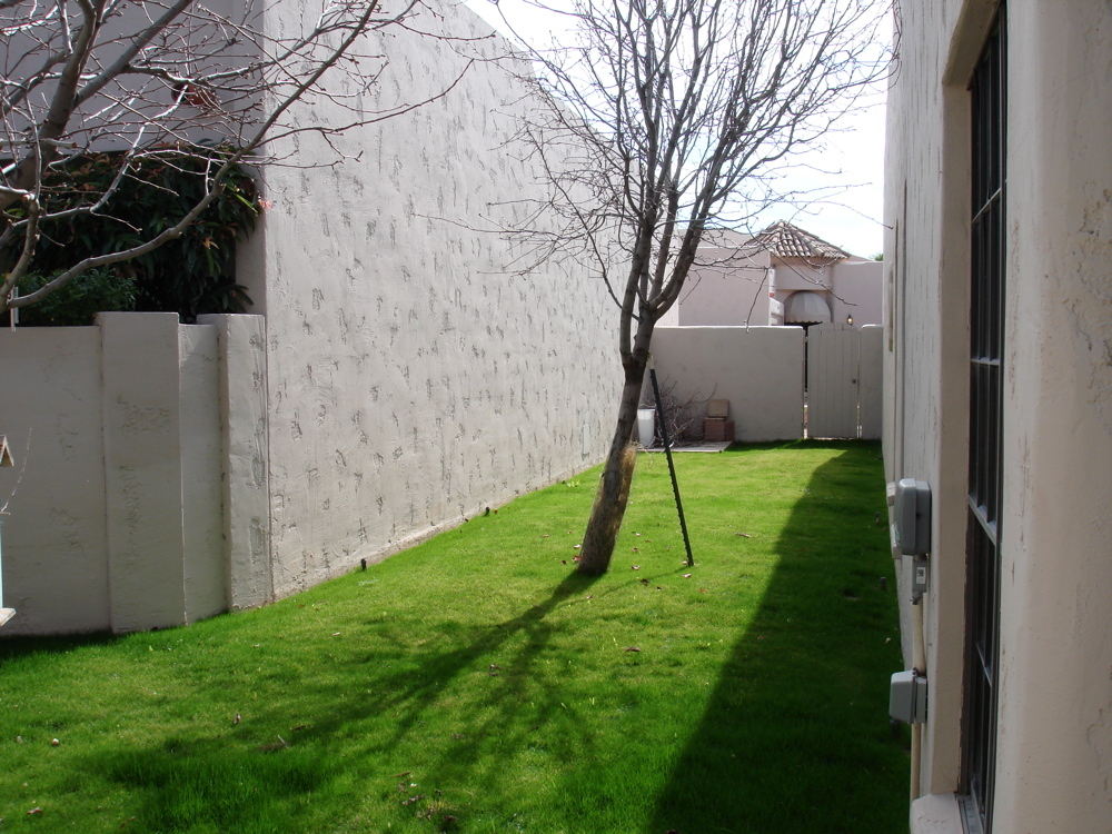 7955 East Chaparral Road, Unit 6 Scottsdale, AZ 85251 - Photo 2 of 9 Side Yard
