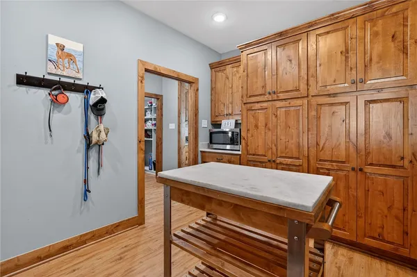 a room with a window and wooden floor