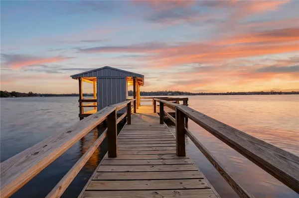 a view of wooden floor with a lake