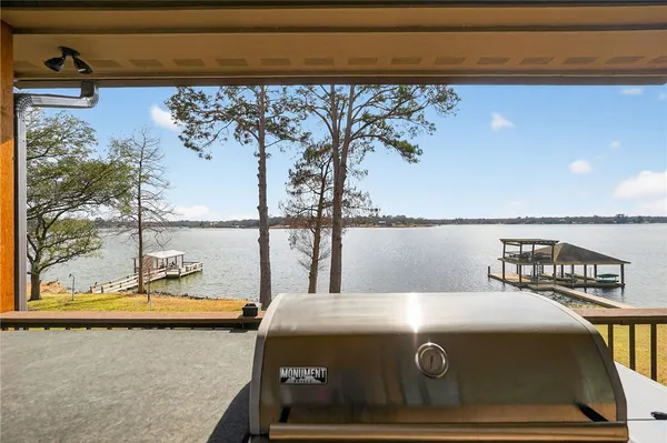 a view of a balcony with an ocean