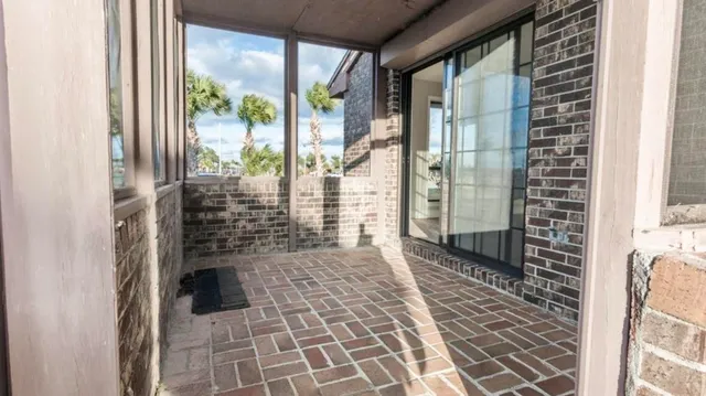 a bathroom with a glass door shower