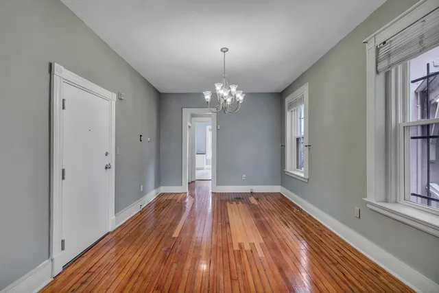 a view of livingroom with hardwood floor and window