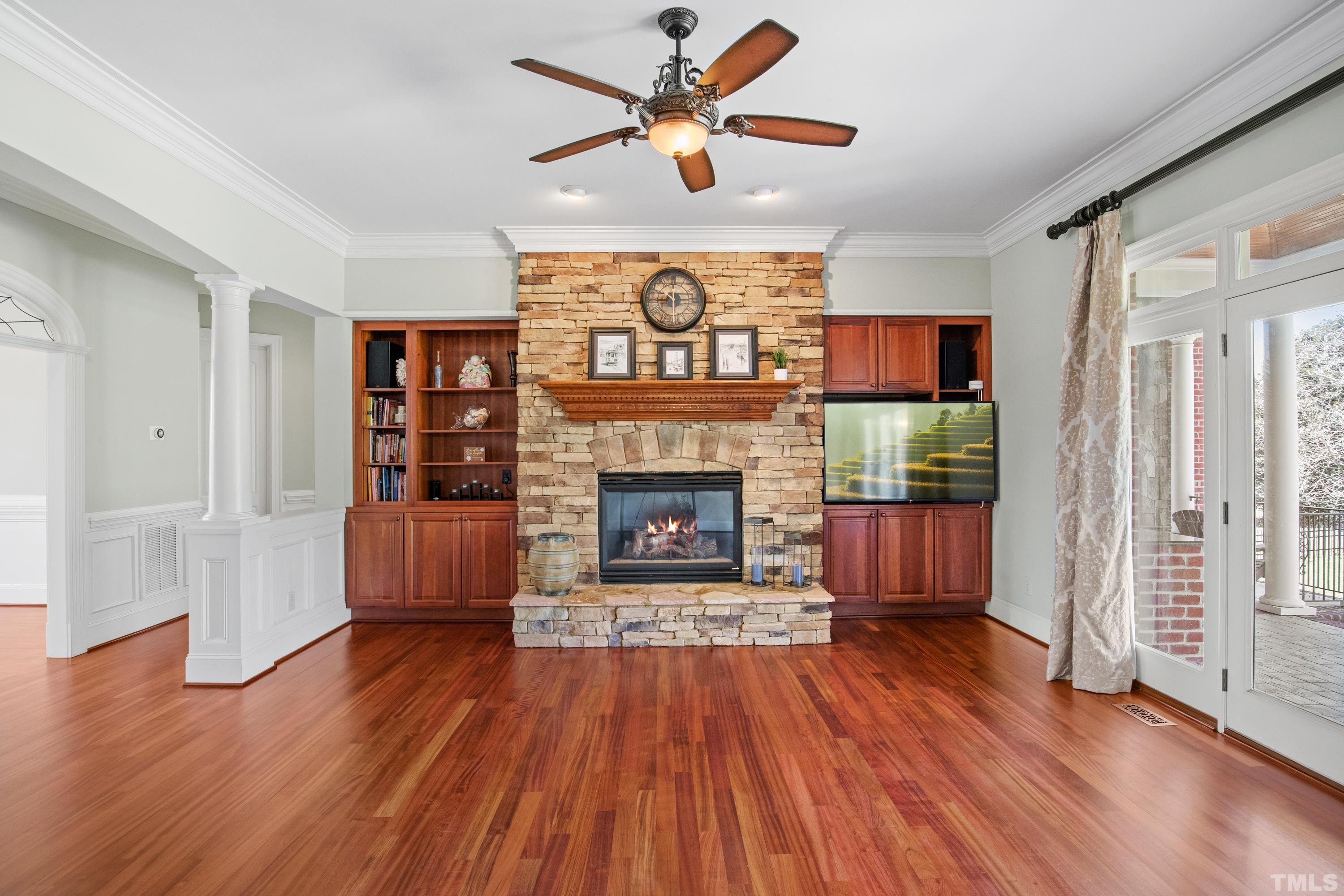 6437 Wakefalls Drive Wake Forest, NC 27587 - Photo 12 of 76 a living room with furniture and a fireplace