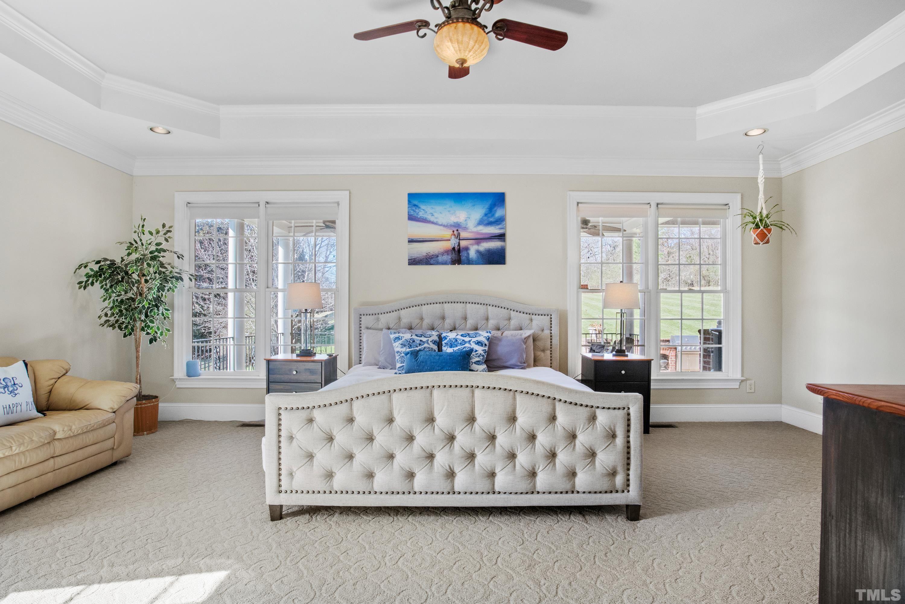 6437 Wakefalls Drive Wake Forest, NC 27587 - Photo 29 of 76 a bedroom with furniture and a large window