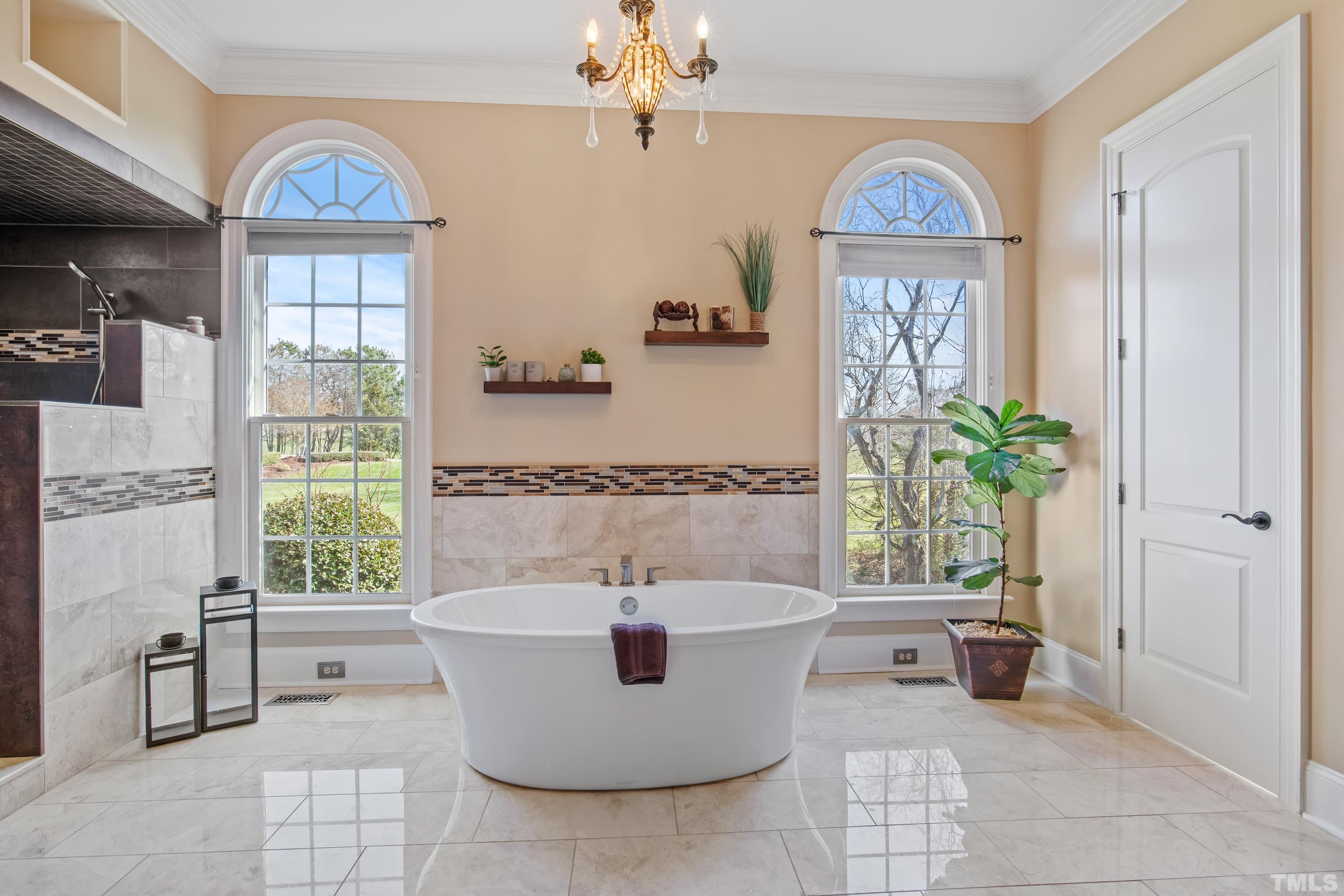 6437 Wakefalls Drive Wake Forest, NC 27587 - Photo 30 of 76 a living room with furniture and a window