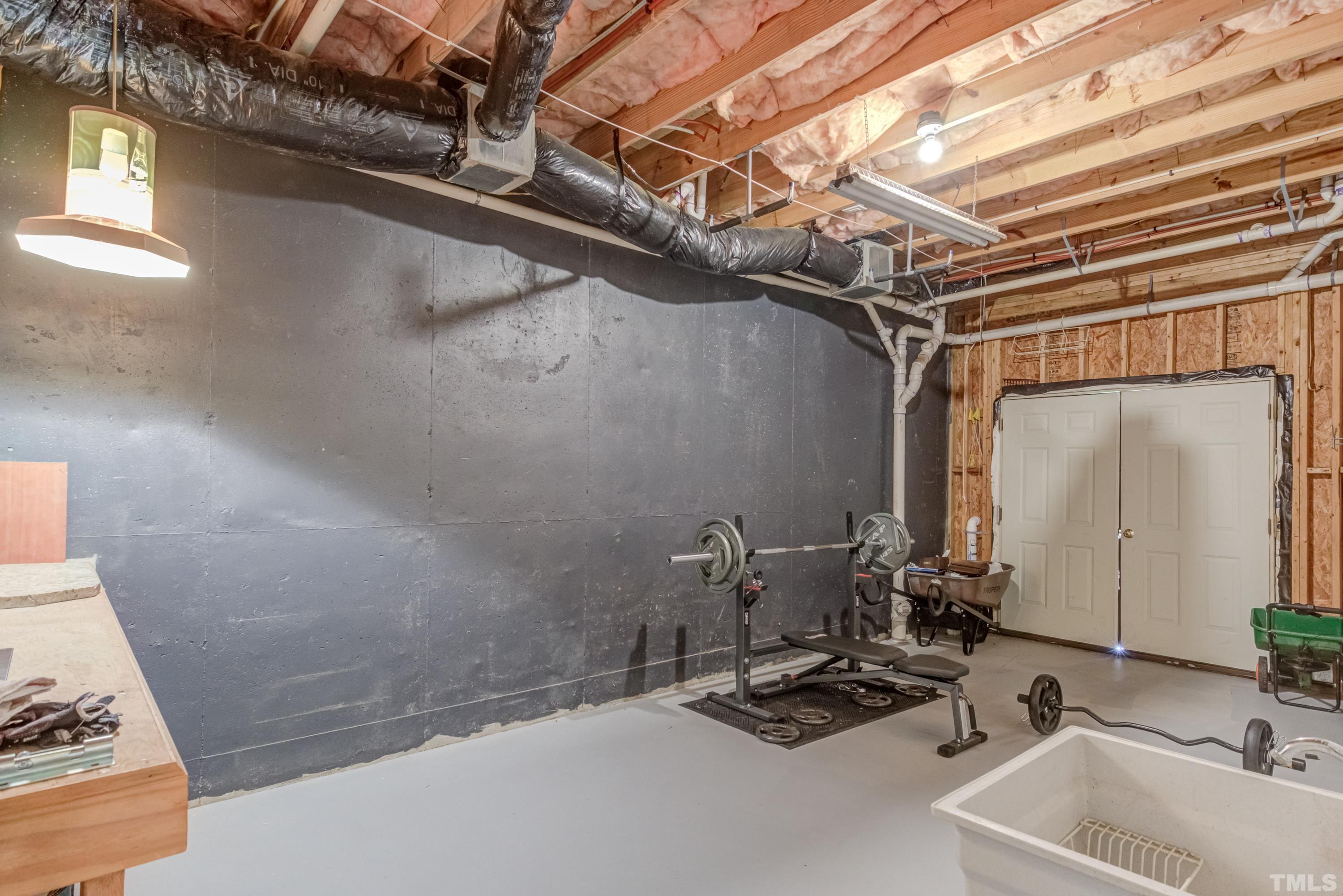 6437 Wakefalls Drive Wake Forest, NC 27587 - Photo 60 of 76 a bathroom with a sink and a mirror
