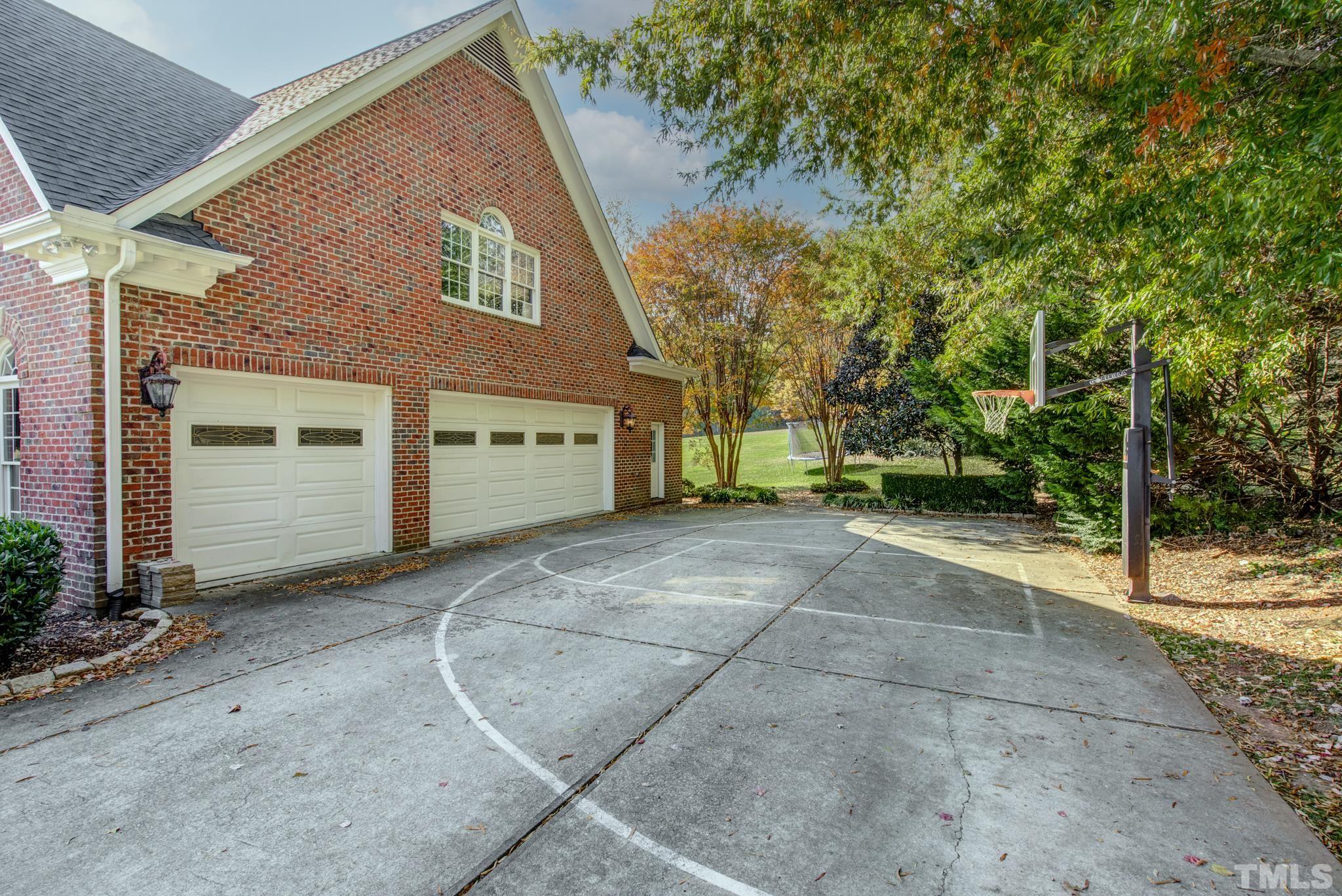6437 Wakefalls Drive Wake Forest, NC 27587 - Photo 69 of 76 a view of a house with a backyard