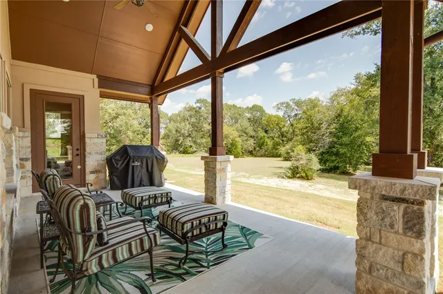 a view of staircase with white walls