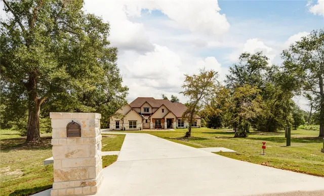 a view of a house with a swimming pool