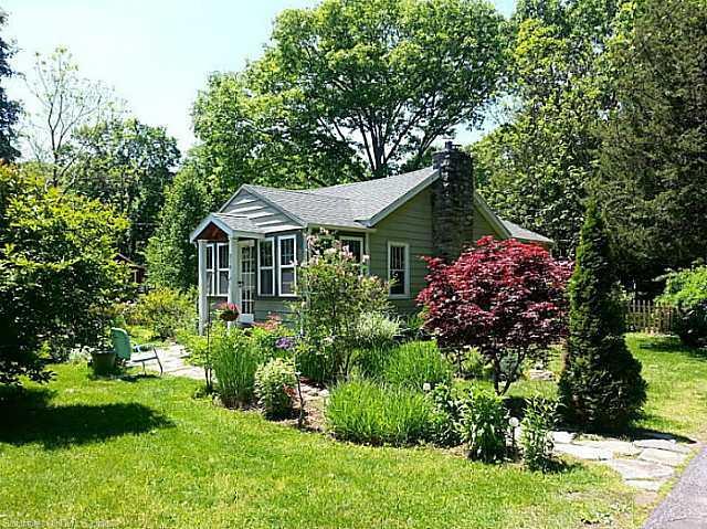316 Maple Trail Coventry, CT 06238 - Photo 1 of 1 a front view of a house with garden