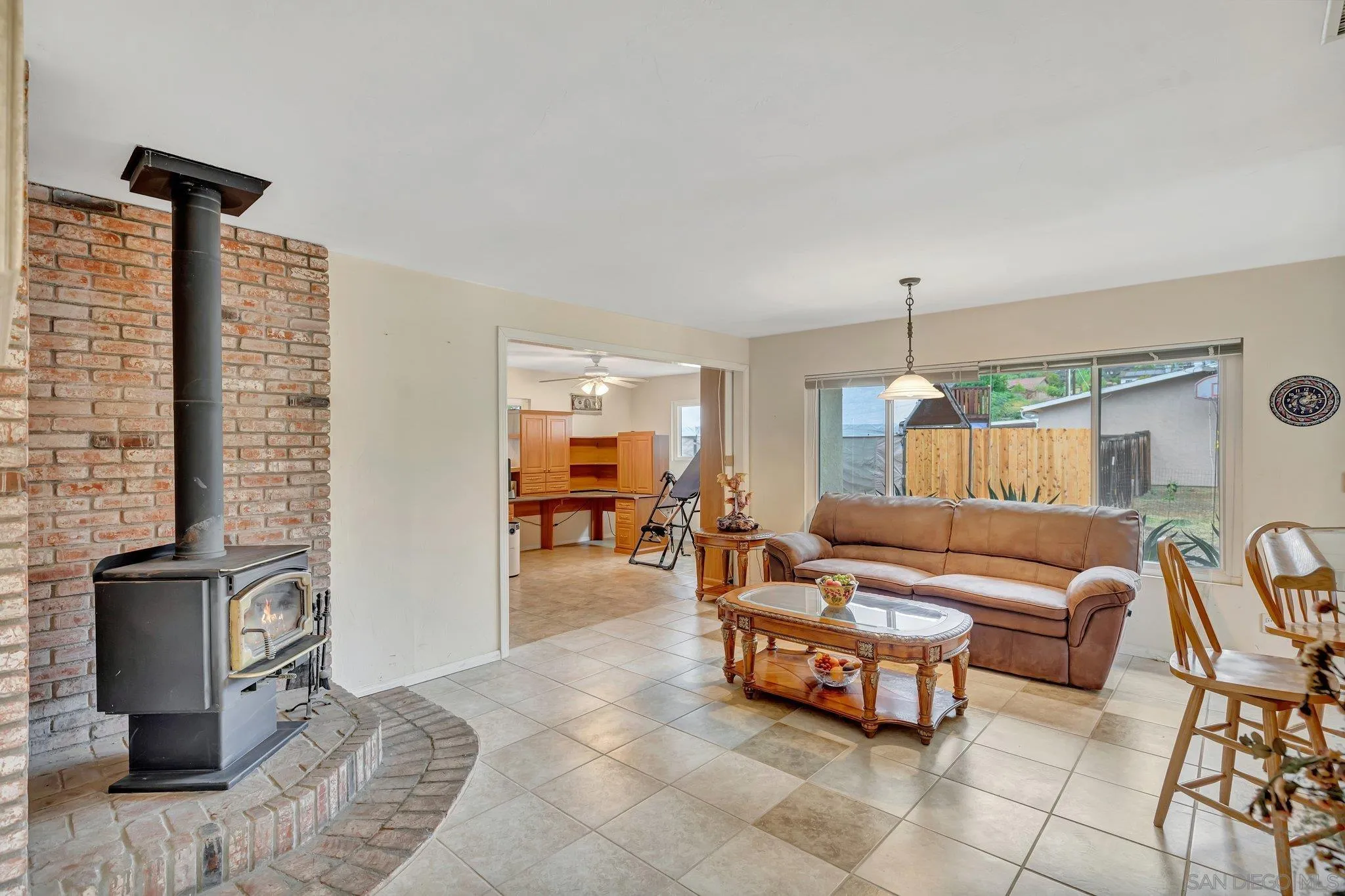 14414 Poway Road Poway, CA 92064 - Photo 11 of 27 a spacious bedroom with a bed and a couch