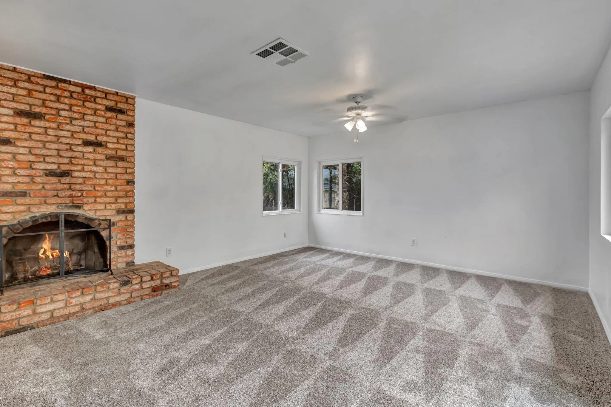 14414 Poway Road Poway, CA 92064 - Photo 14 of 27 a view of an empty room with window and fireplace
