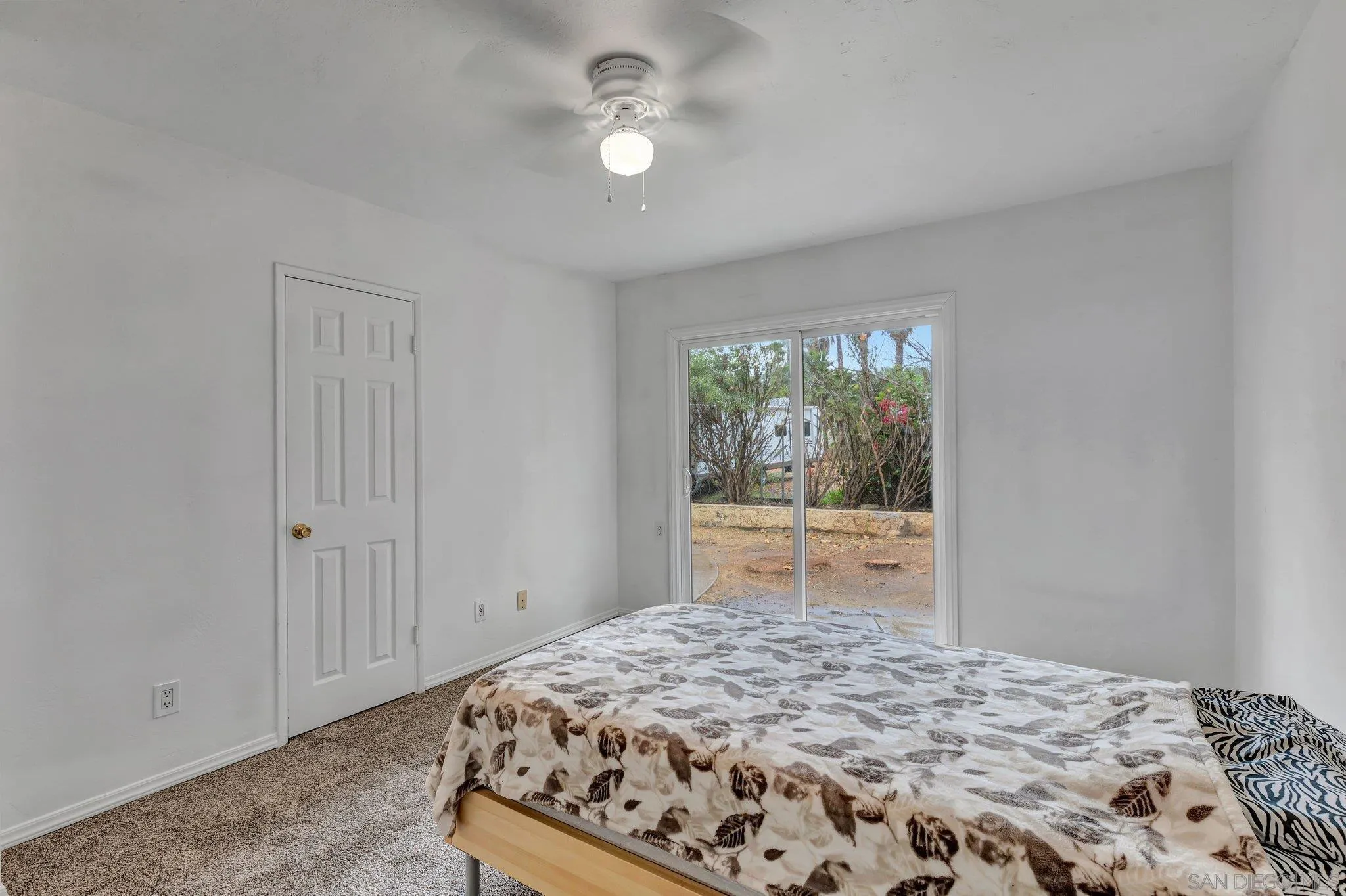 14414 Poway Road Poway, CA 92064 - Photo 23 of 27 a bedroom with a bed and a window
