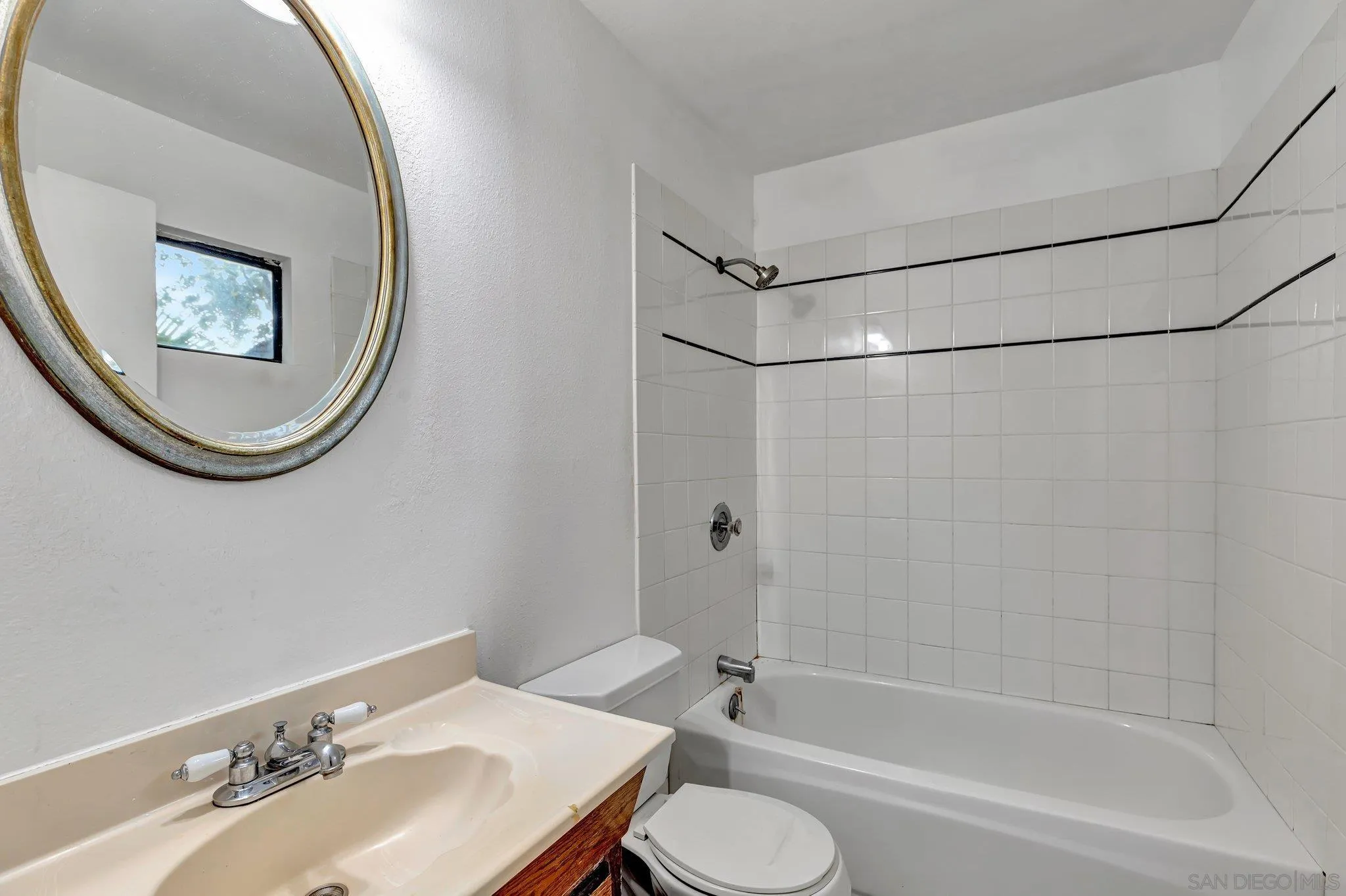 14414 Poway Road Poway, CA 92064 - Photo 27 of 27 a bathroom with a sink a toilet and a mirror
