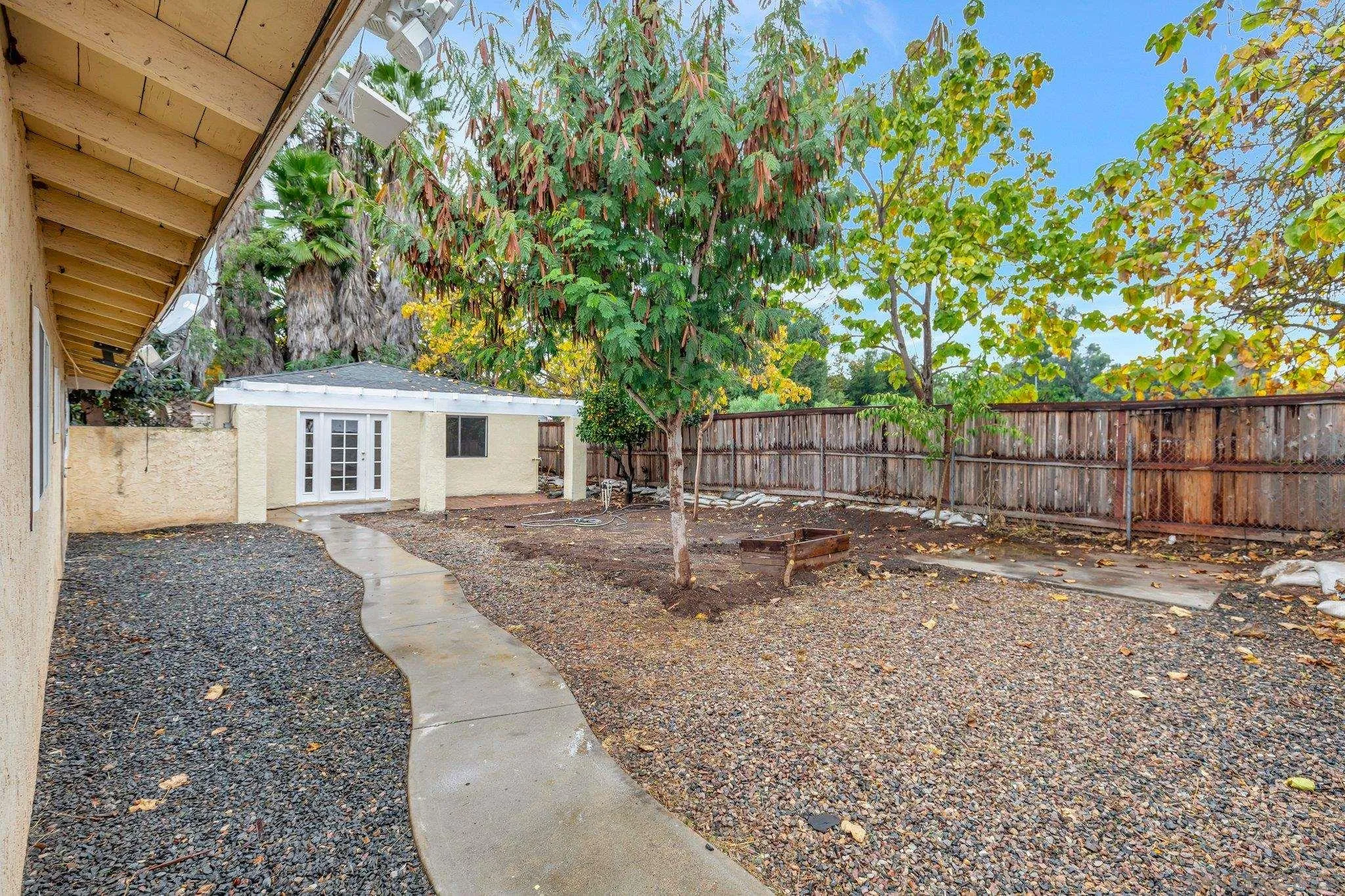 14414 Poway Road Poway, CA 92064 - Photo 7 of 27 a backyard of a house with table and chairs