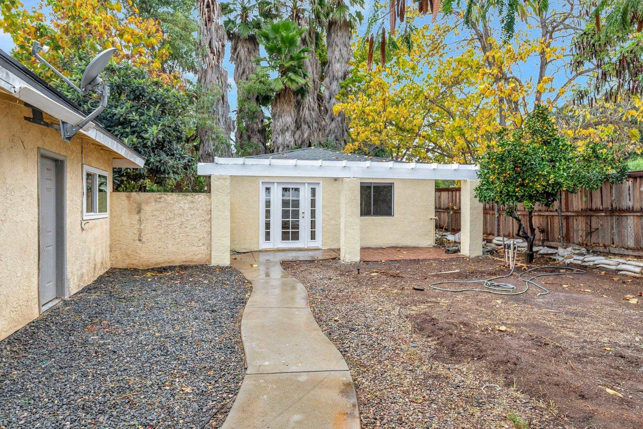 14414 Poway Road Poway, CA 92064 - Photo 8 of 27 a view of a backyard with a tree