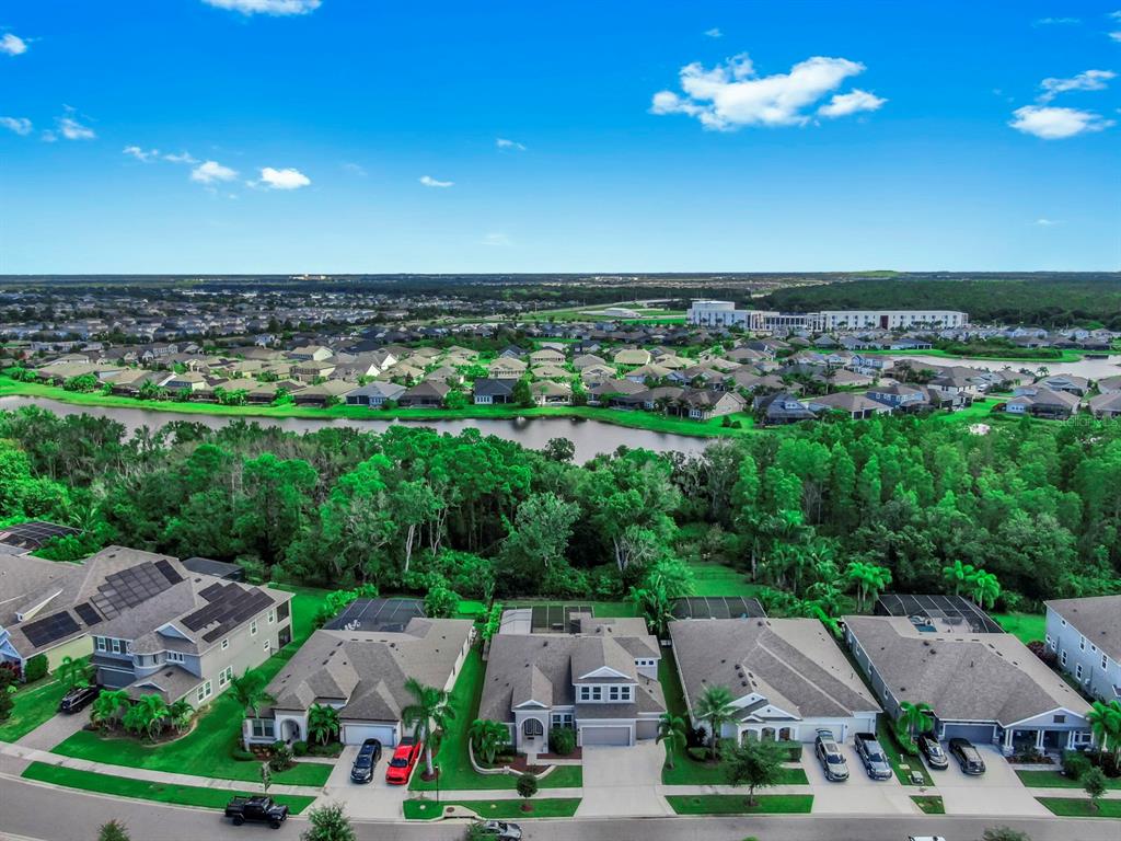 7709 Paradiso Drive Apollo Beach, FL 33572 - Photo 2 of 64 an aerial view of residential houses with outdoor space and street view