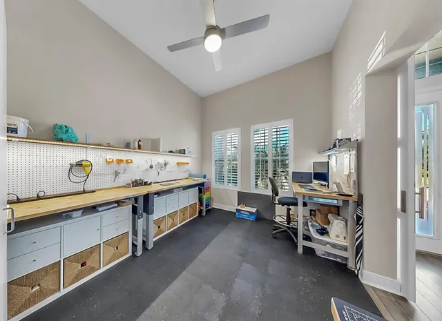a spacious bathroom with a tub sink and mirror