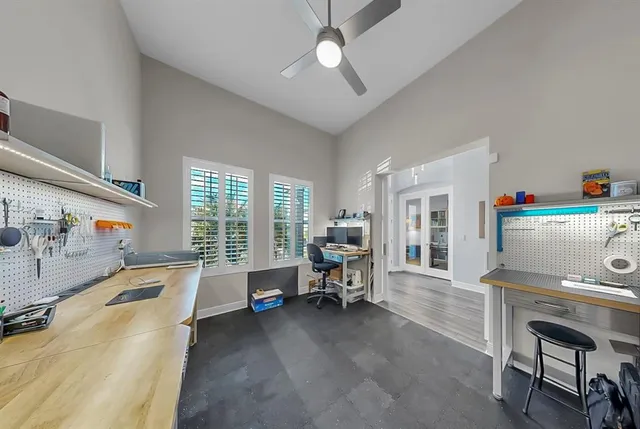 a spacious bathroom with a double vanity sink a mirror and a shower
