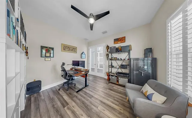 a spacious bathroom with a tub shower and window