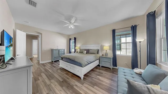 a view of entryway with wooden floor and stairs