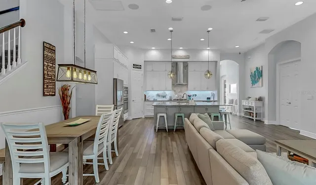 a living room with fireplace furniture and a flat screen tv
