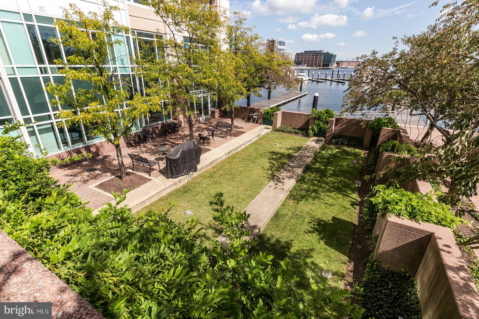 100 Harborview Drive, Unit 1701 Baltimore, MD 21230 - Photo 44 of 44 a view of a swimming pool with a patio