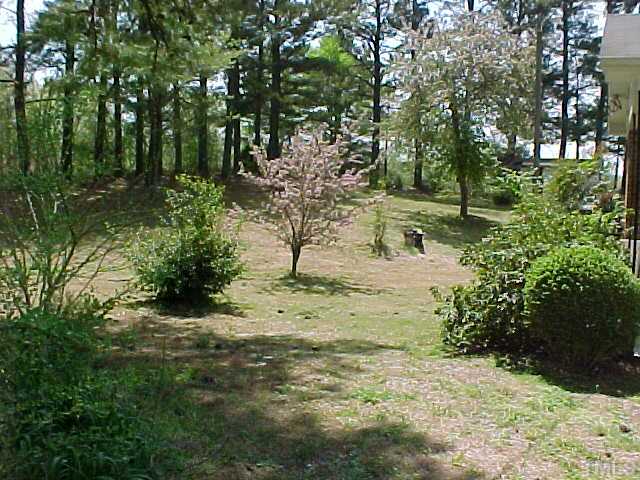 680 Vicksboro Road Henderson, NC 27537 - Photo 2 of 7 Nicely landscaped yard