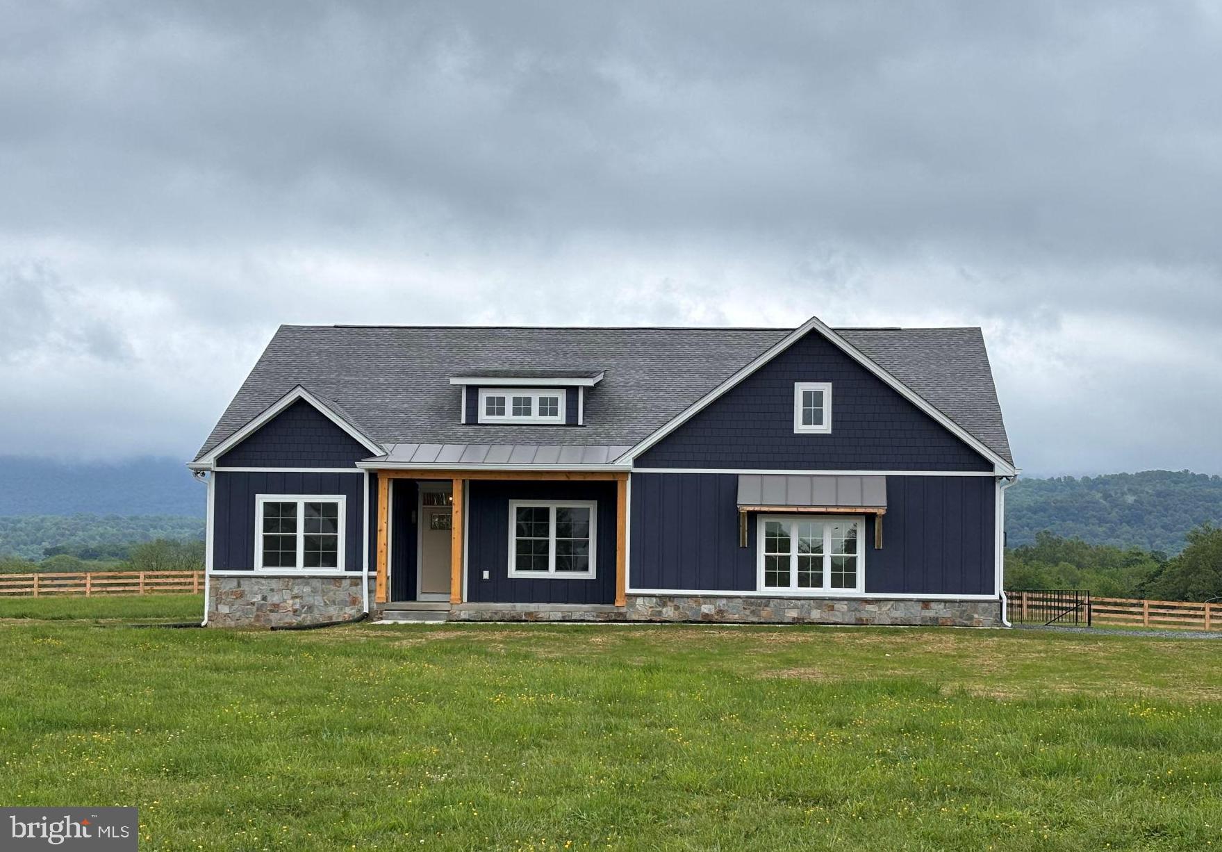 Lot#2 Winebrenner Road Martinsburg, WV 25404 - Photo 1 of 11 a front view of a house with a garden