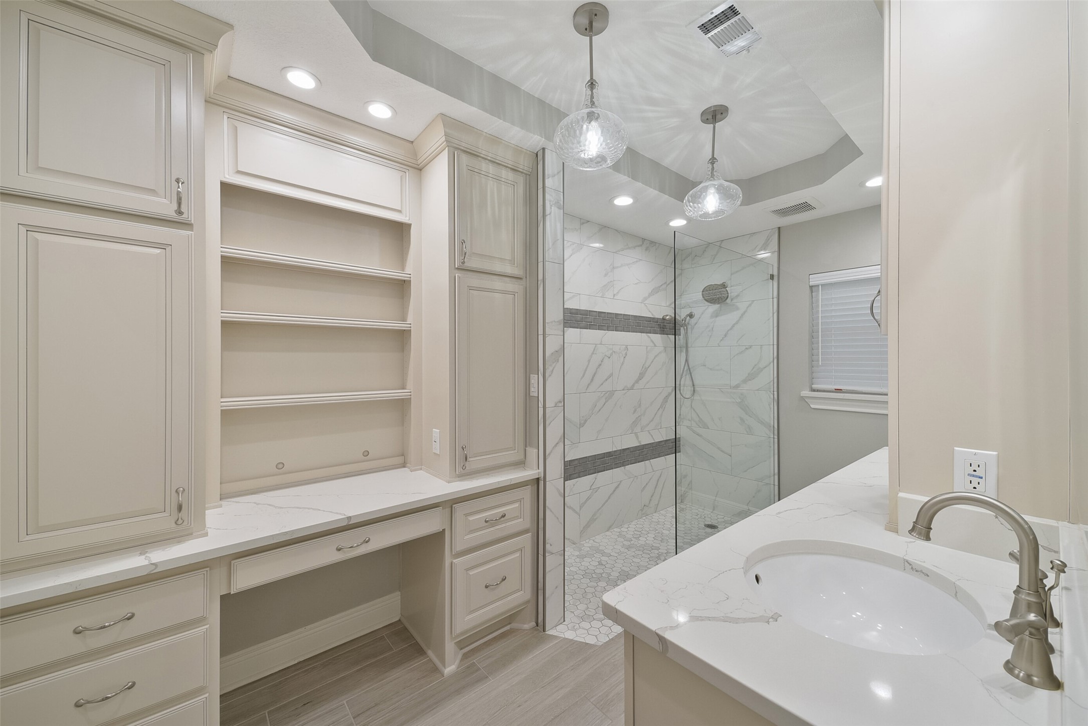 2915 Katy Hockley Road Katy, TX 77493 - Photo 21 of 50 Beautifully updated Primary bathroom with custom cabinets, quartz countertops and walk in shower.