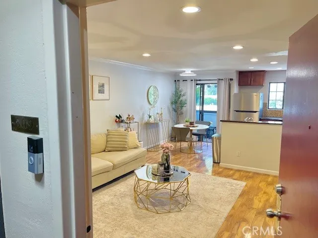 a living room with furniture and a table