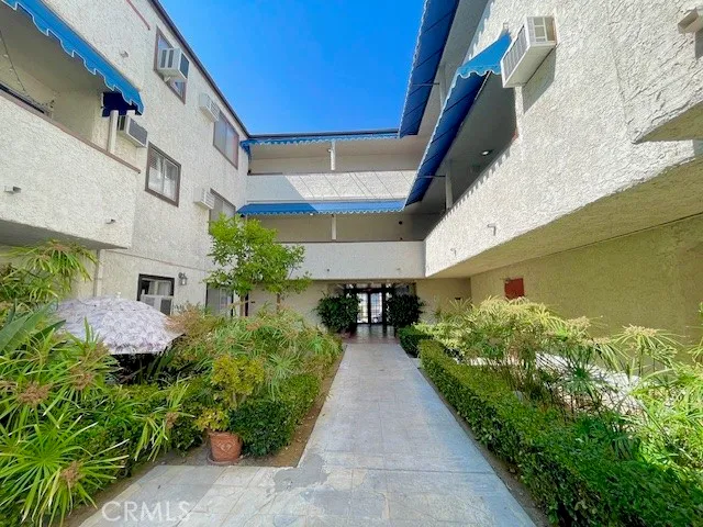 a view of a house with entertaining space