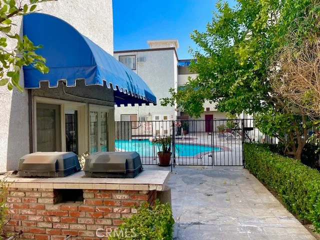 a room with lots of wooden furniture and a mirror
