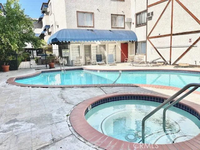 a bathroom with a sink and a large mirror