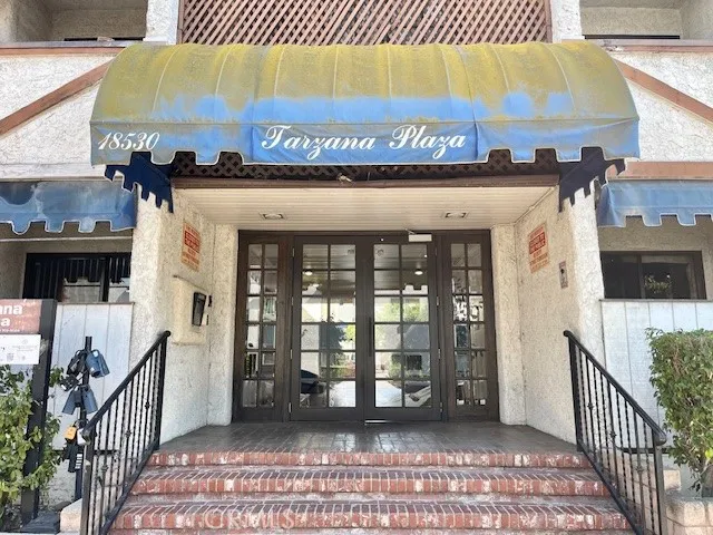 a view of front door and house