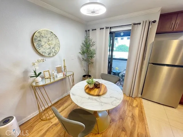 a view of a dining room with furniture and a table